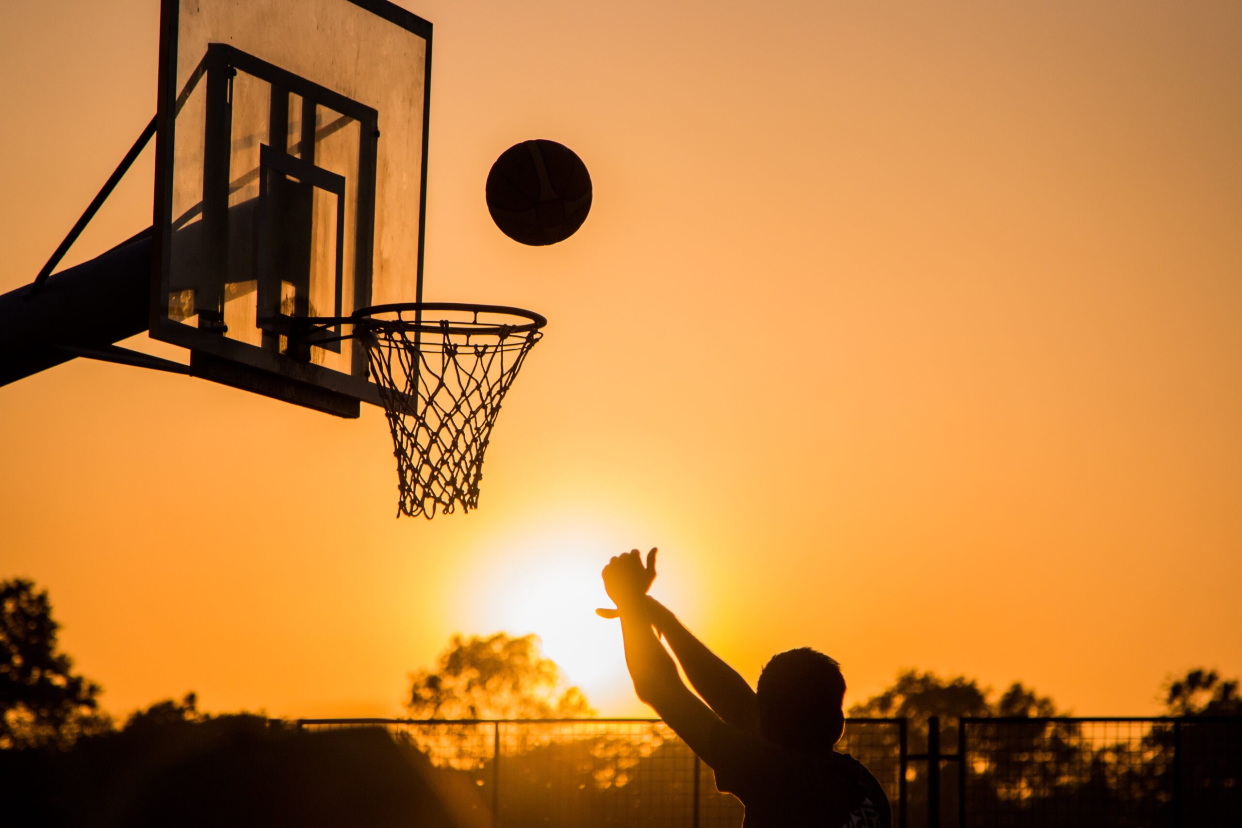 Canva_20-_20A_20Man_20Playing_20Basketball-scaled-1.jpg